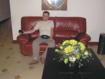 Sitting on a red sofa is like walking on a red carpet..Peter has a dream of power and authority...  